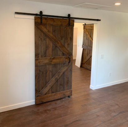 Garage conversion ADU with open-plan living area and kitchenette in Temecula