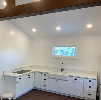 Traditional kitchen upgrade with white cabinetry and granite countertops in Winchester